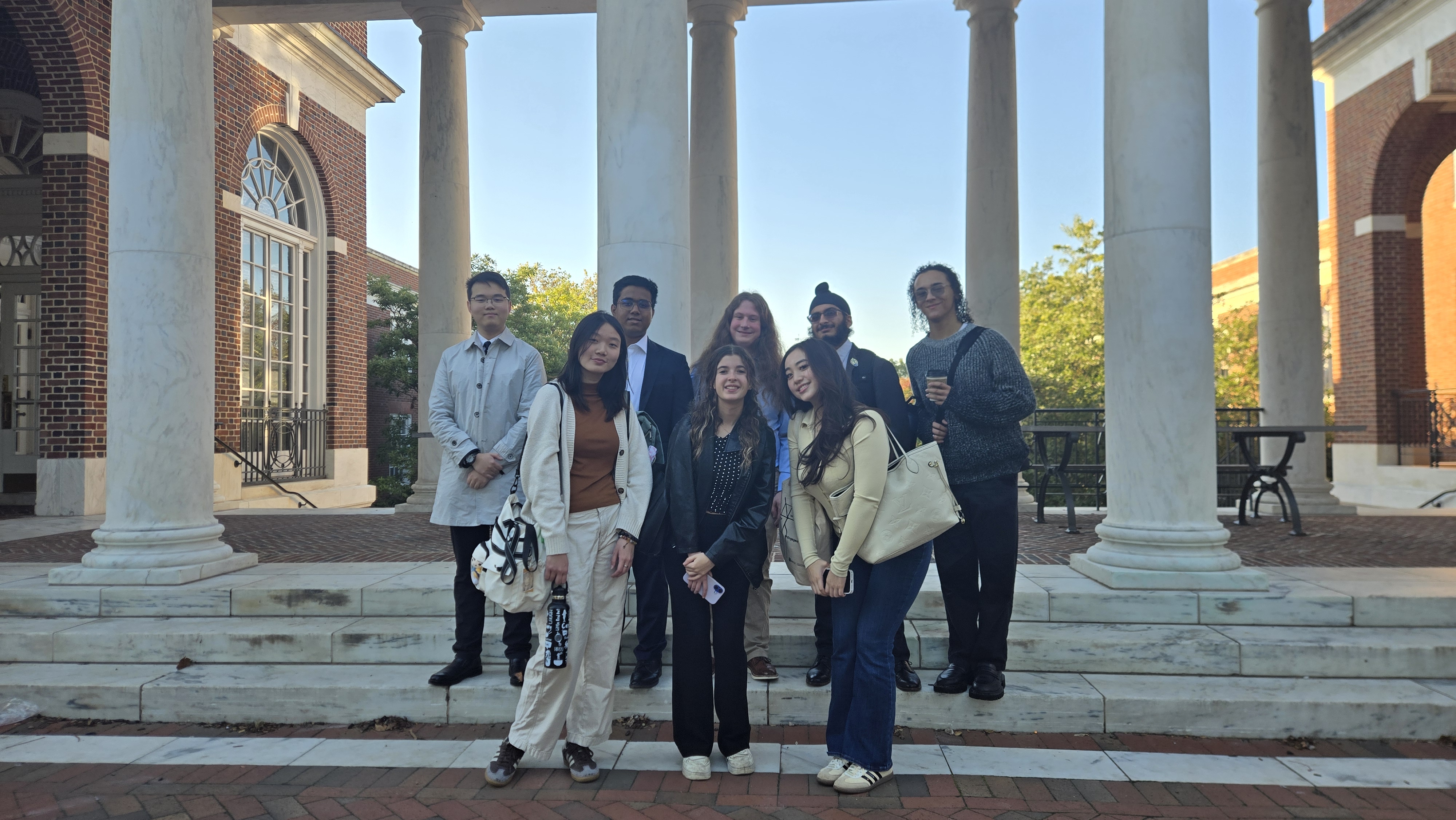 NYU debaters pause for air outside the Hopkins venue