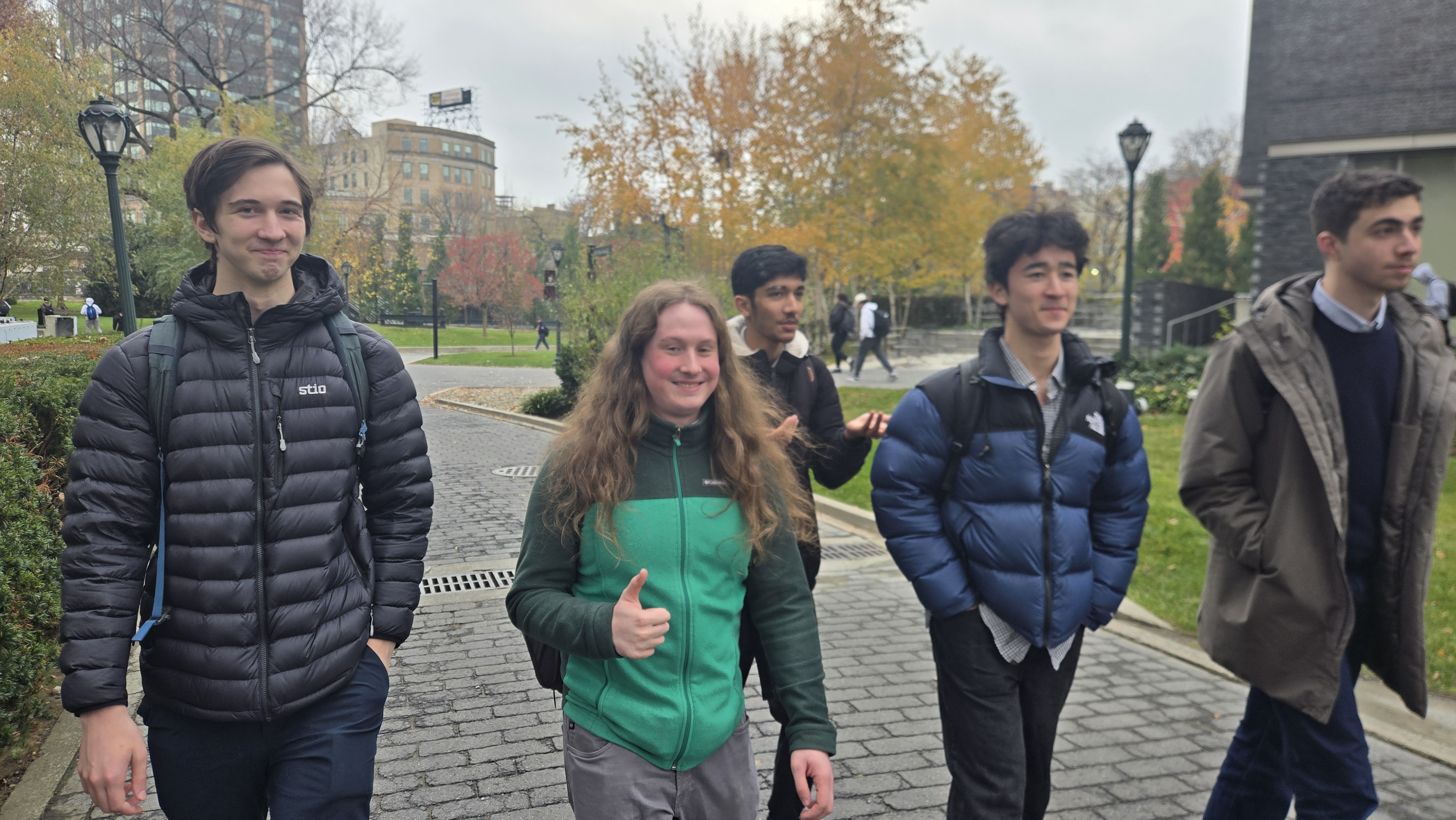 Team members heading into Fordham's campus for round check-in