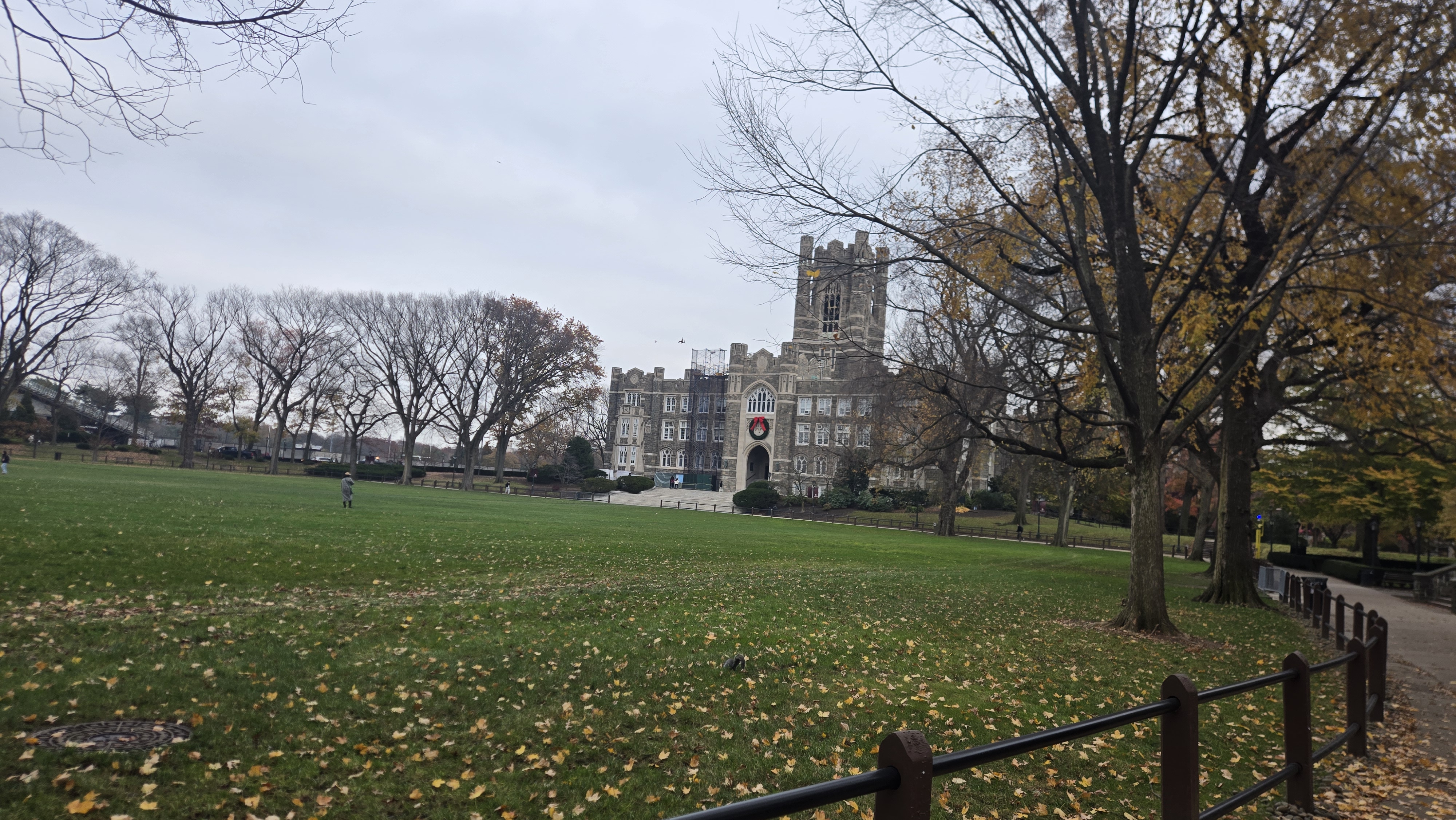 NYU debaters greeting one another outside the Fordham tab room