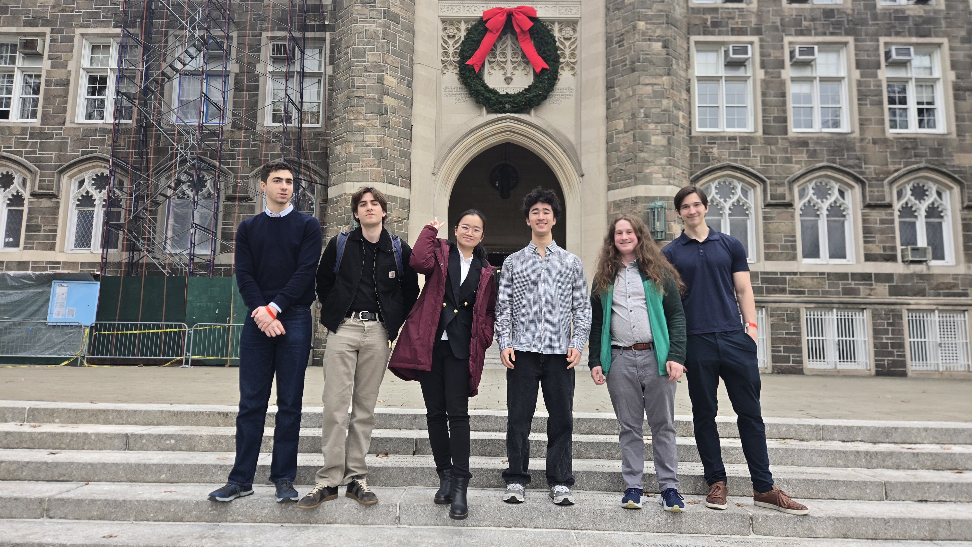 Friends laughing together after a round at Fordham