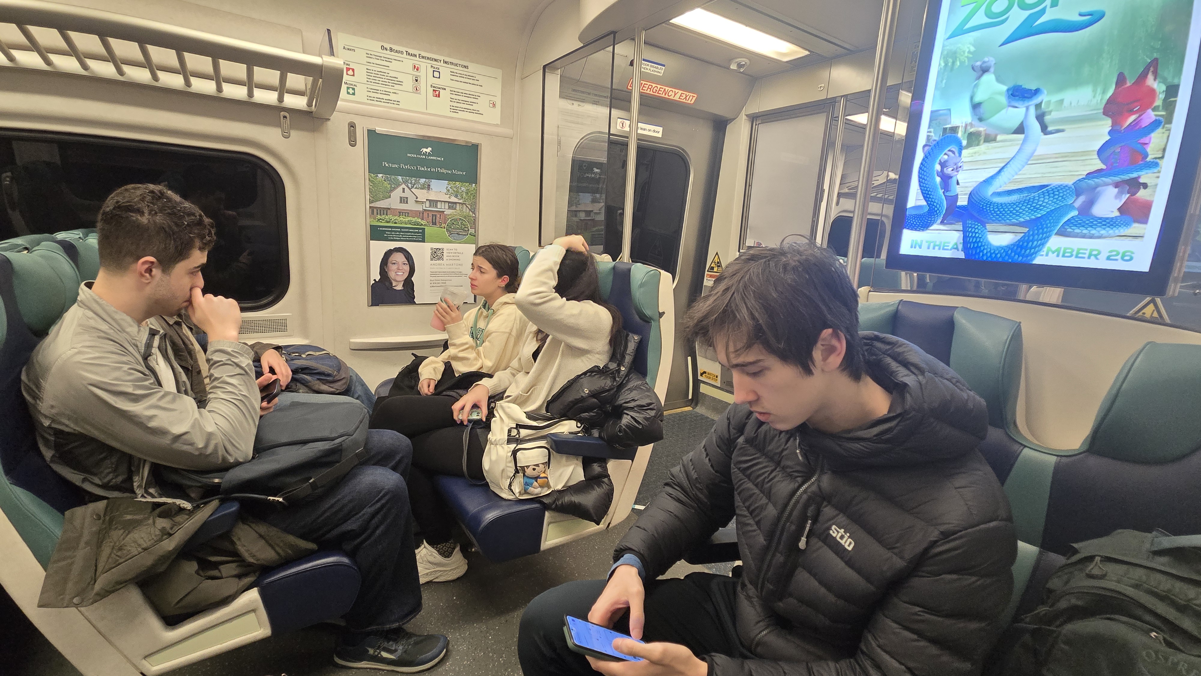 Early morning briefing with NYU debaters holding coffees
