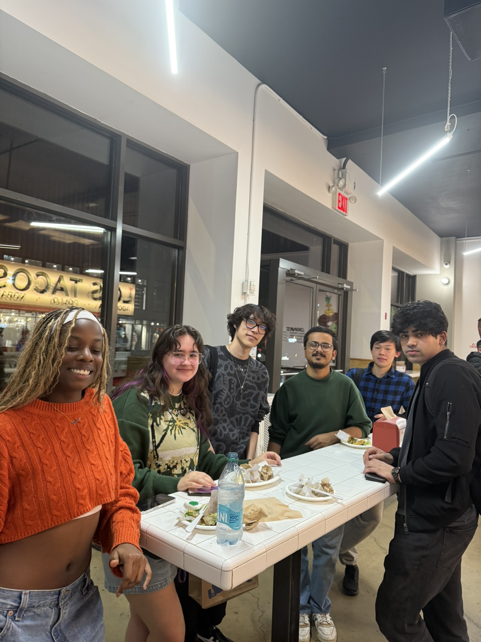 Friends posing at a tournament venue